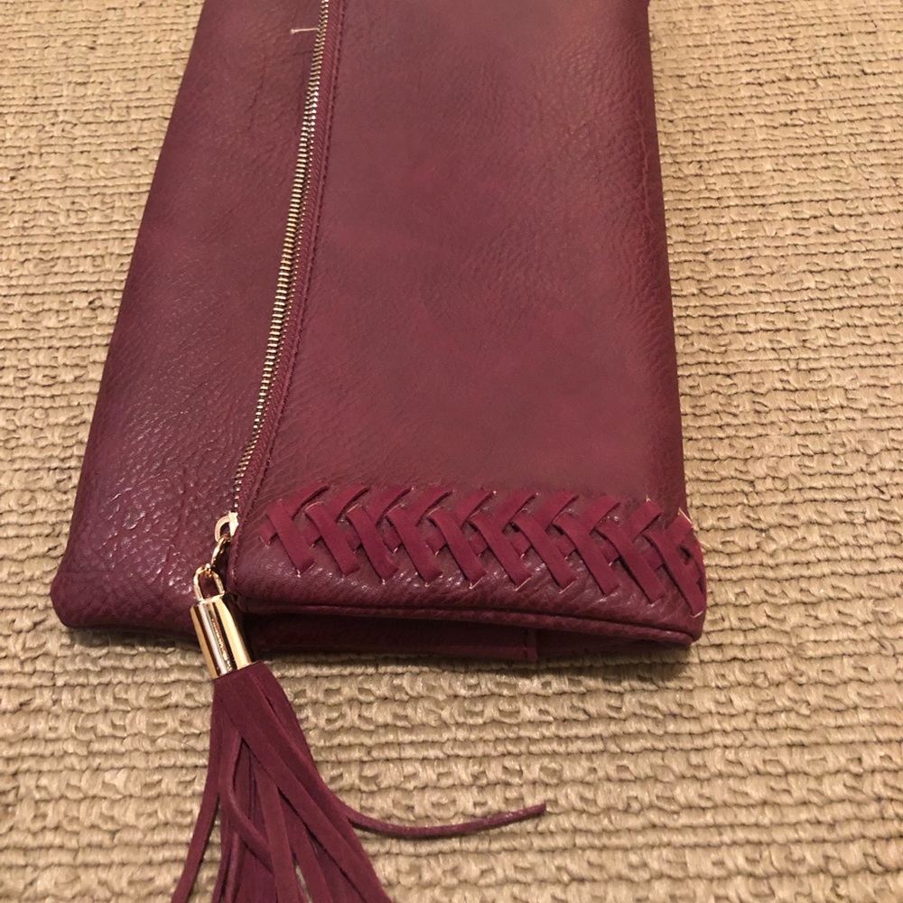 Leather wine colored clutch
